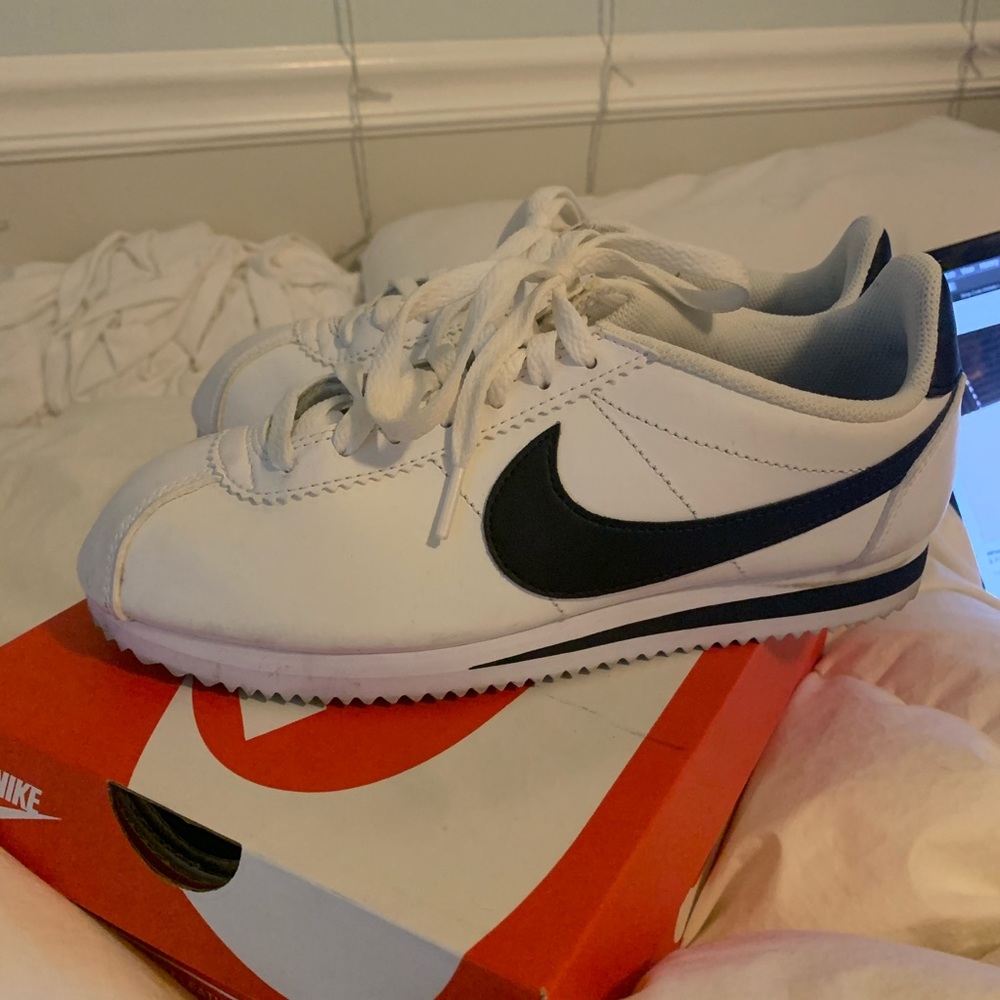 nike white and black cortez